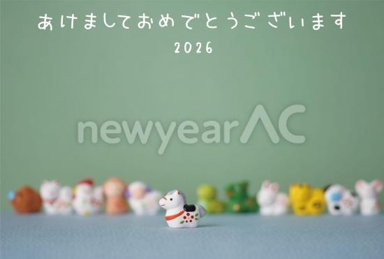 緑背景の集合干支年賀状