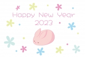 眠るピンクうさぎの年賀状
