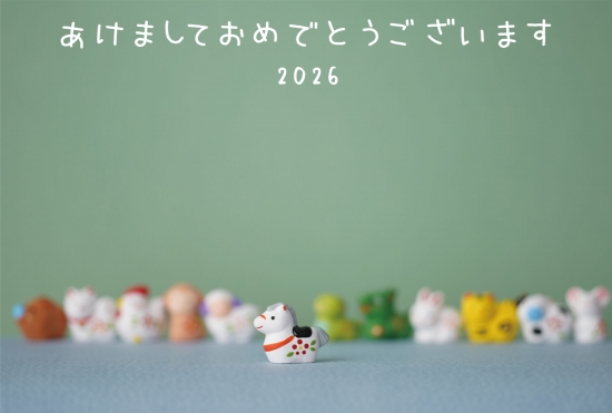緑背景の集合干支年賀状